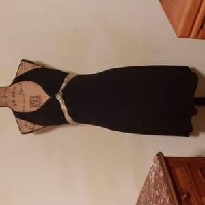 Fitted black halter style dress.